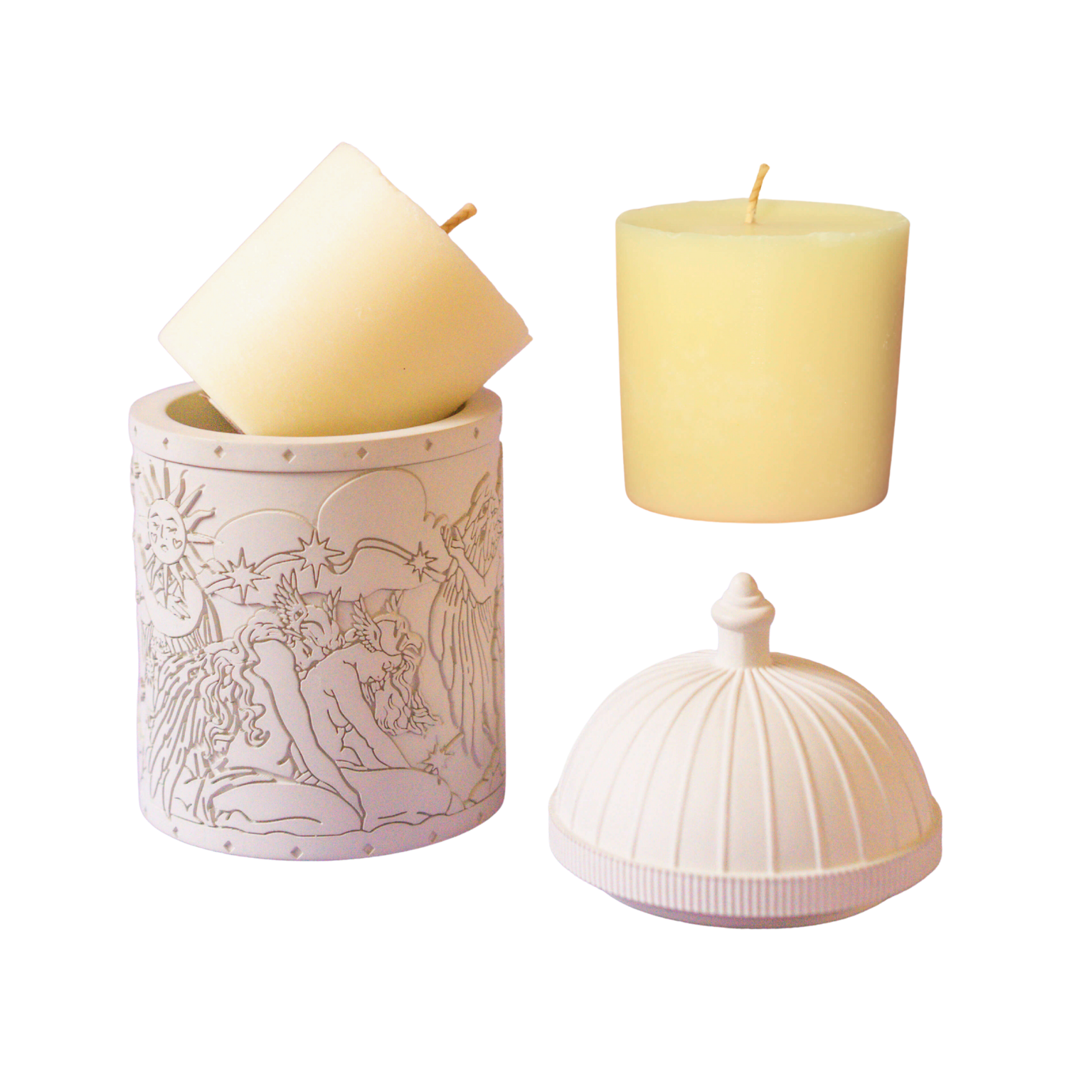 Two candles, one in a decorative holder with intricate designs, on a white background.